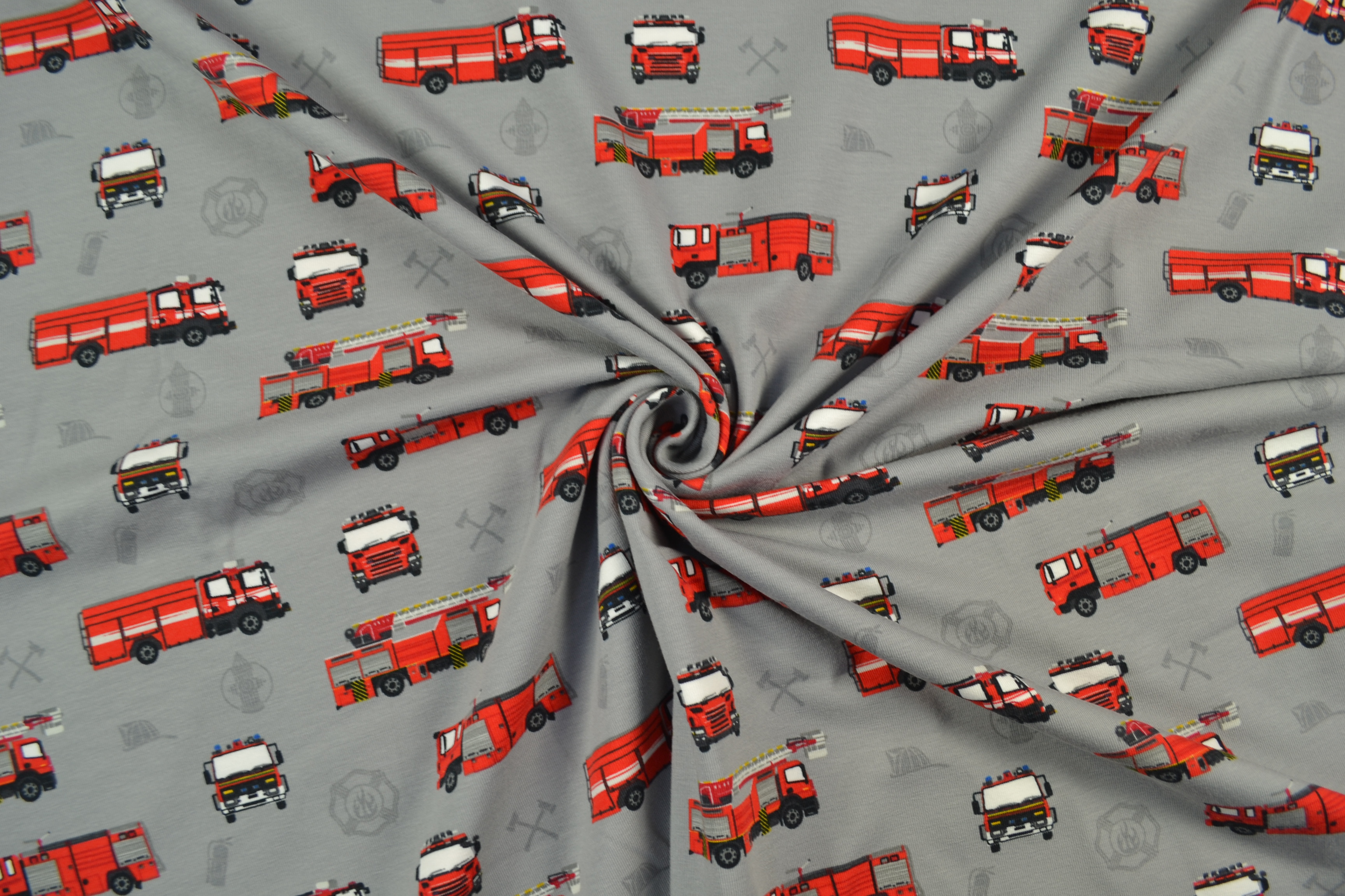Baumwolljersey gemustert Feuerwehrfahrzeuge, grau