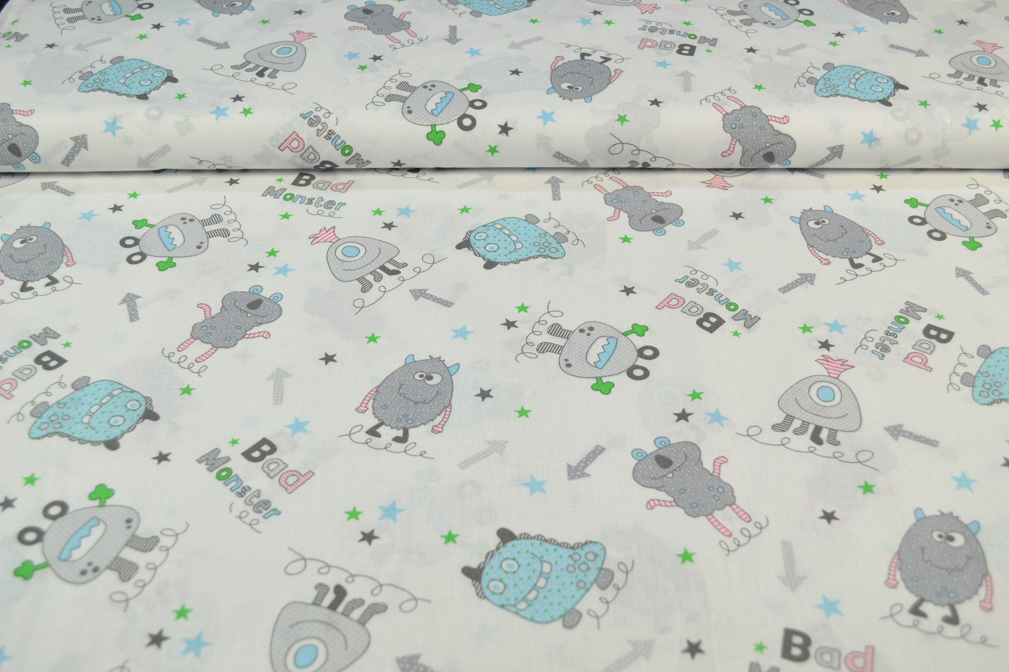 Baumwollstoff Monster, grau