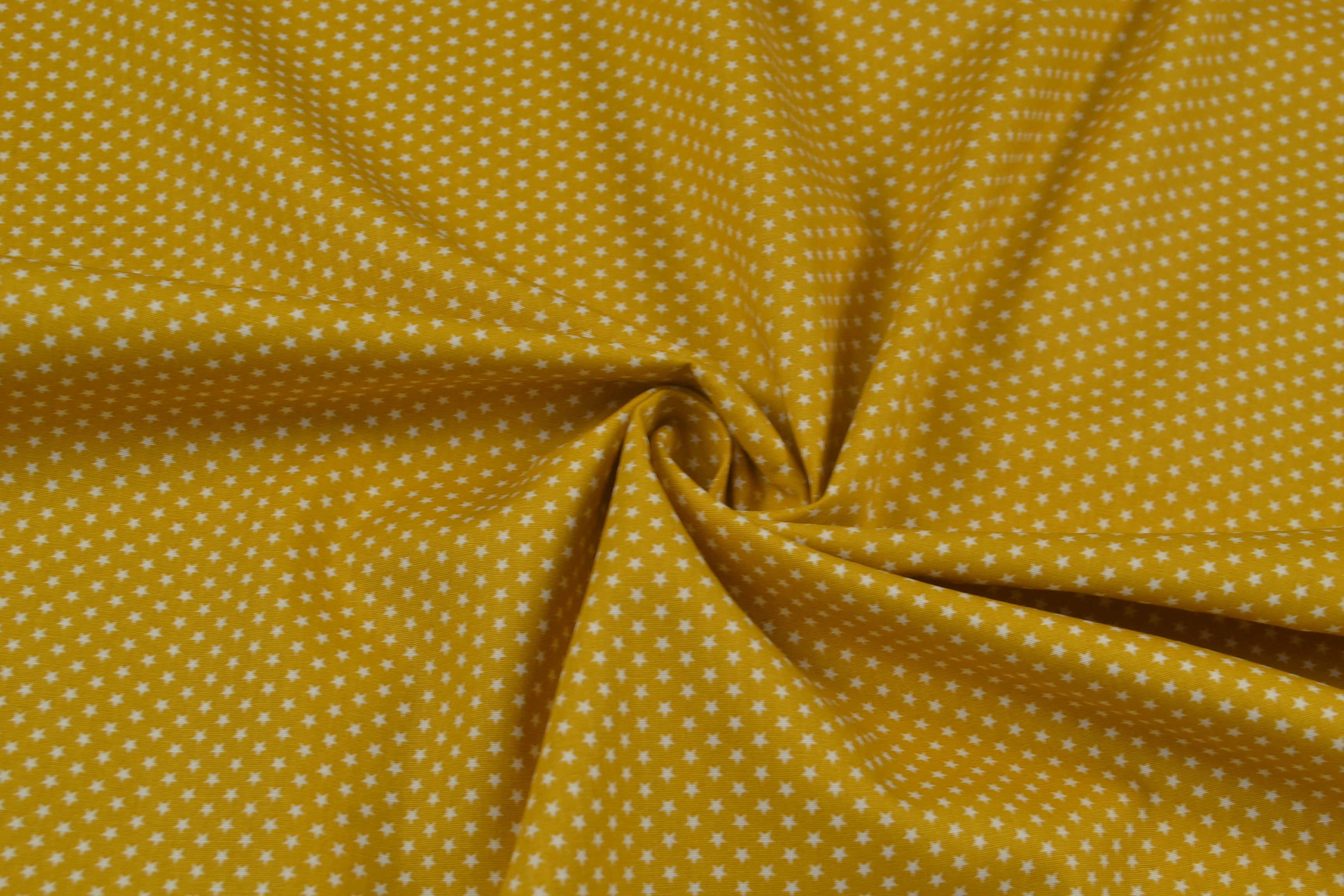 Baumwollstoff Popeline kleine Sterne, senfgelb