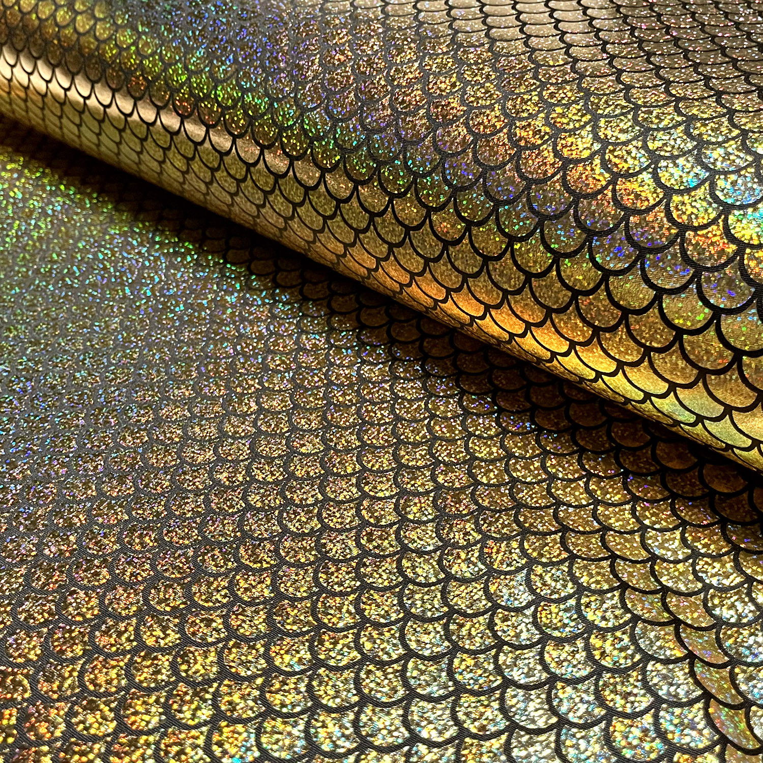 Lamé Stoff Foliendruck Meerjungfrau Gold